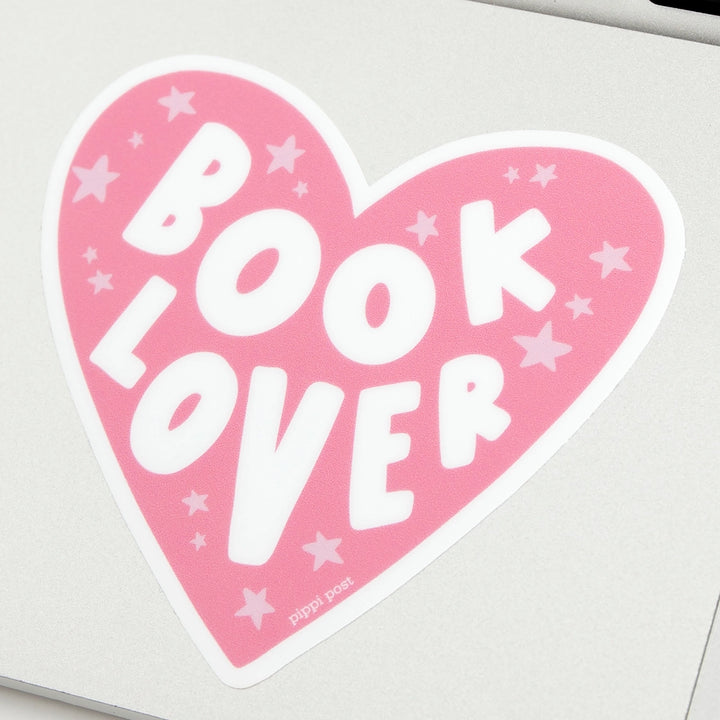 Pink heart-shaped sticker with &