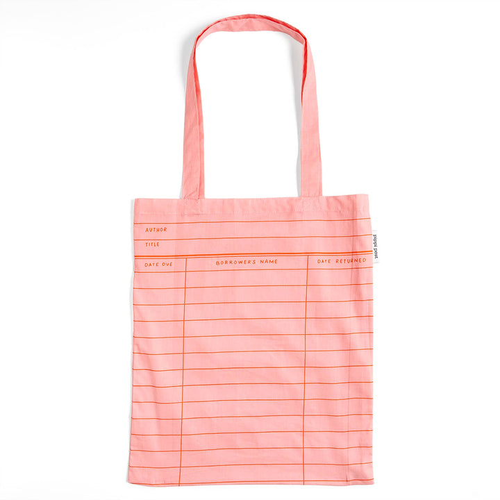 Pink tote bag with grid pattern on a white background