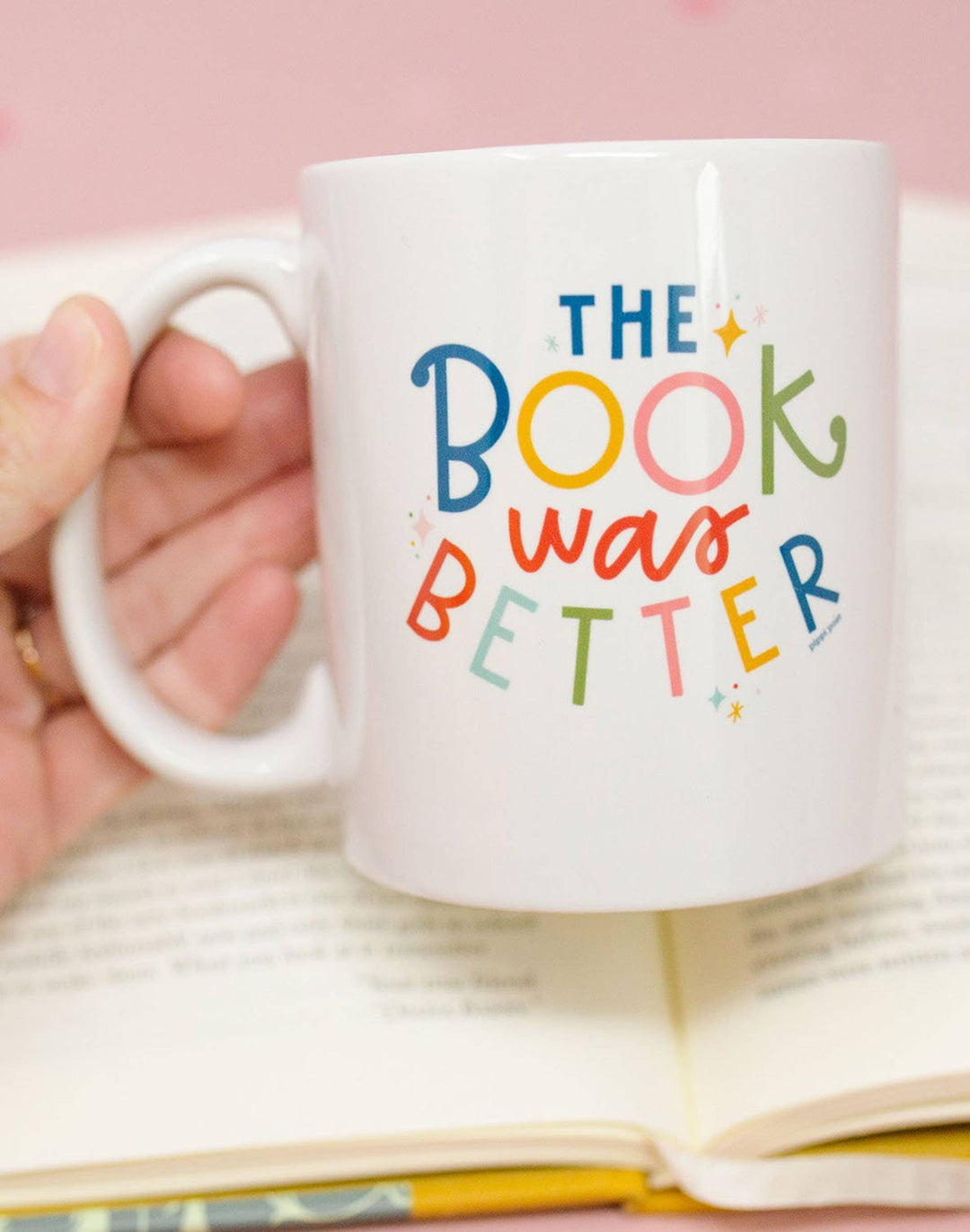 White mug with colorful text &