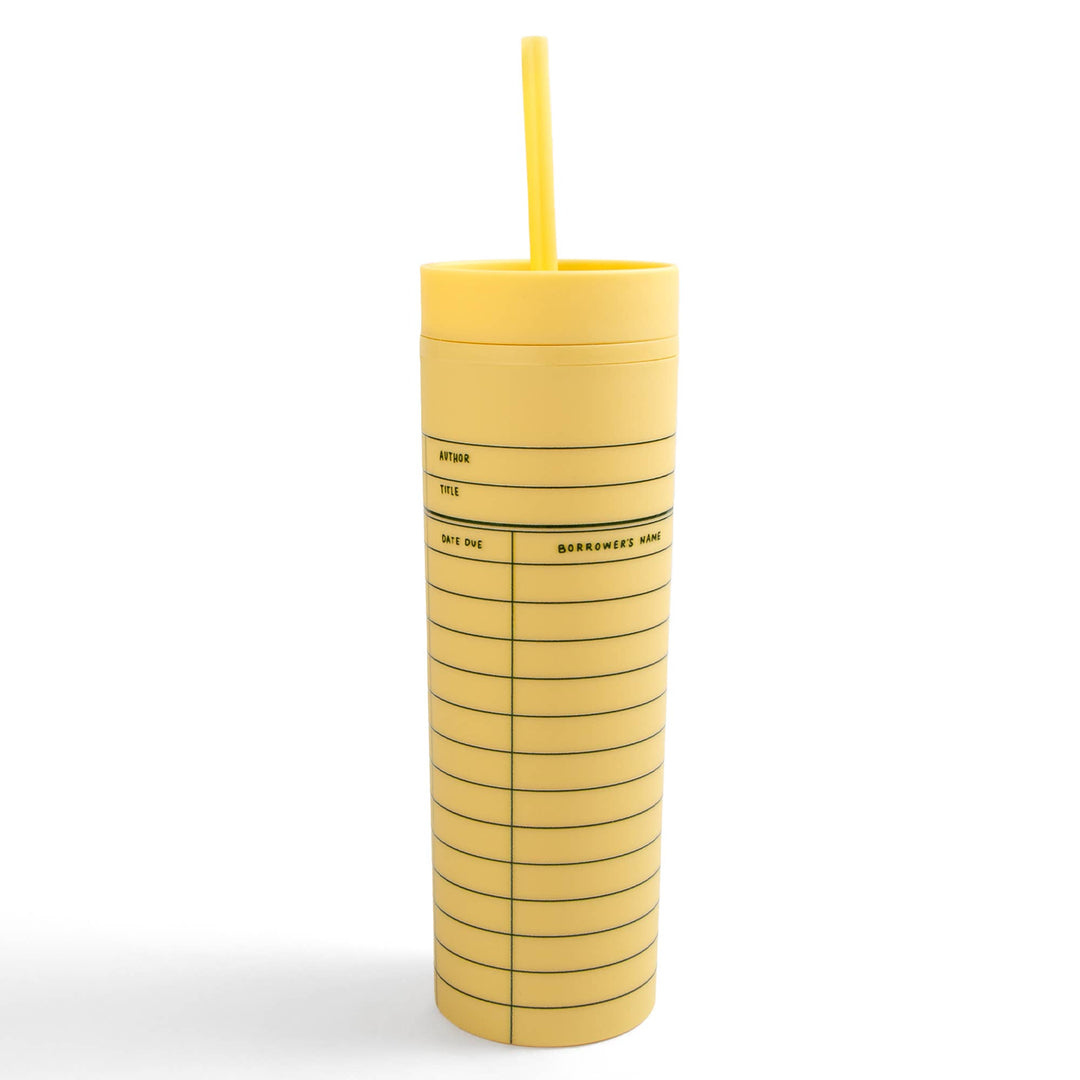Yellow tumbler with a straw on a white background