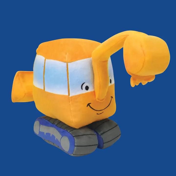 Plush toy excavator on a blue background