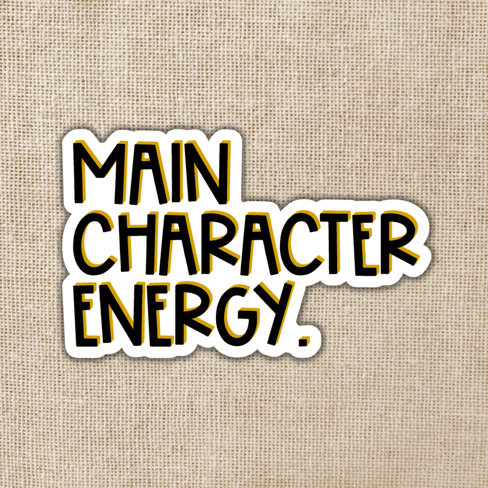 Text 'MAIN CHARACTER ENERGY.' in black and yellow on a beige textured background