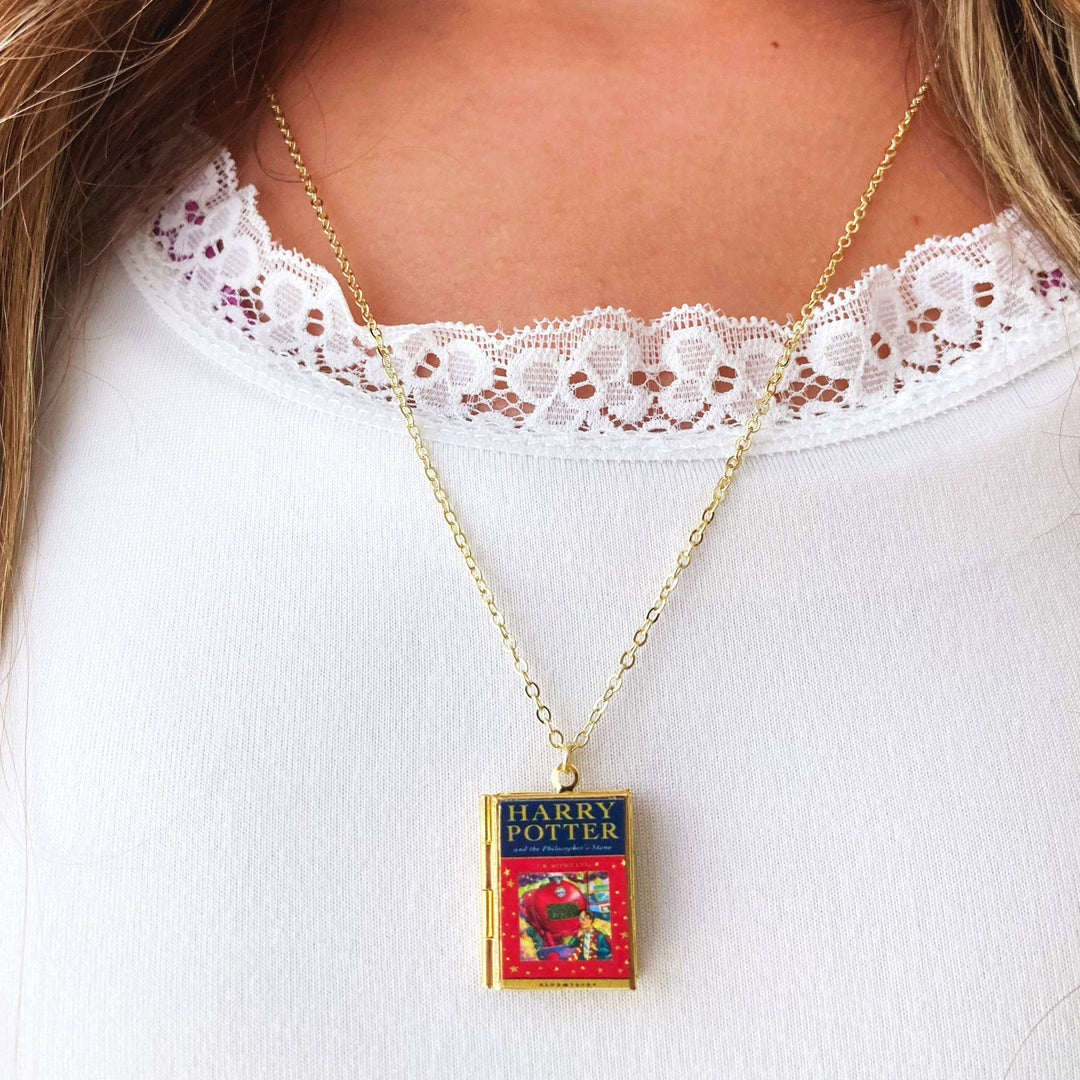 Gold necklace with a &