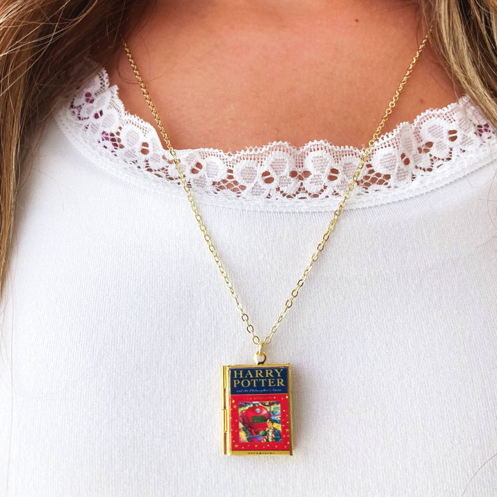 Gold necklace with a &