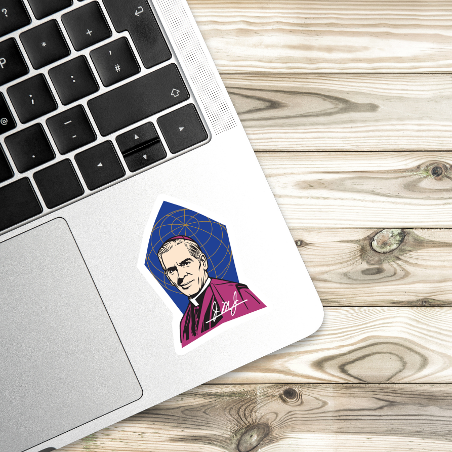 Laptop with a sticker of a person in a purple robe on a wooden surface