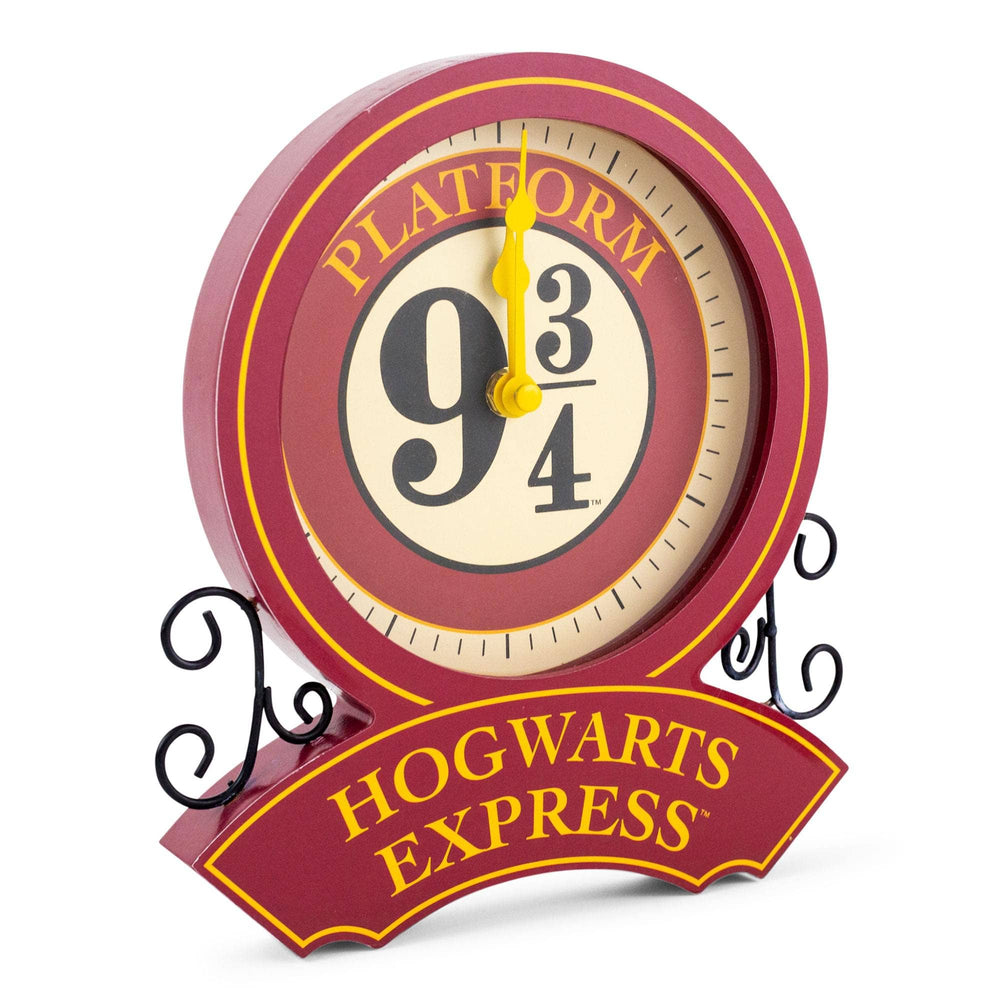 Decorative clock with 'Platform 9 3/4' and 'Hogwarts Express' design on a white background