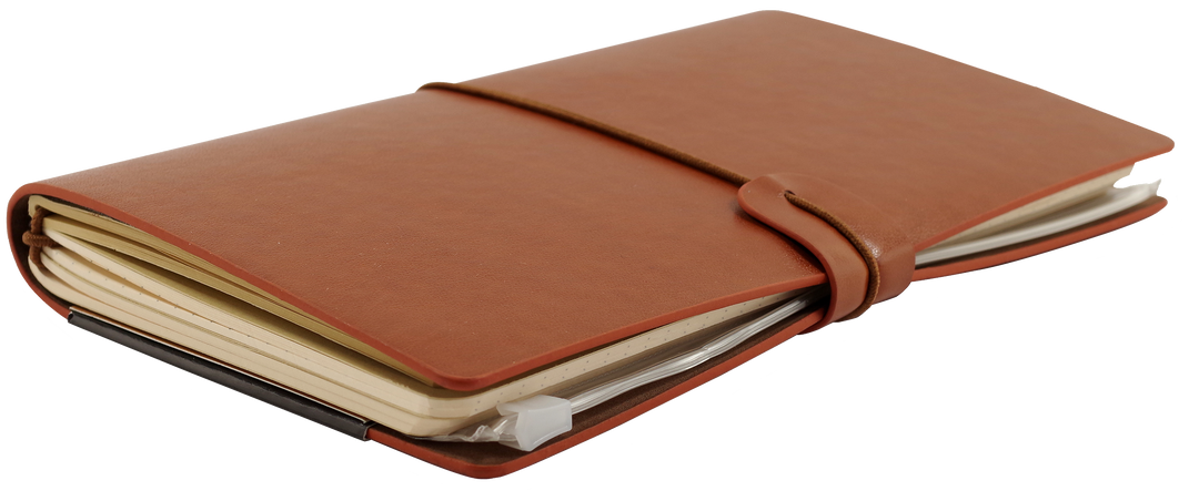 Brown leather notebook with a strap closure on a white background