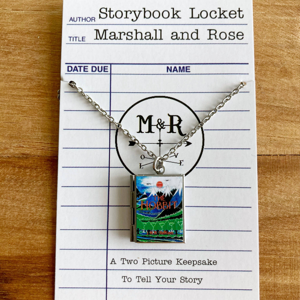 Storybook Locket by Marshall and Rose on a library card with 'M&R' initials.