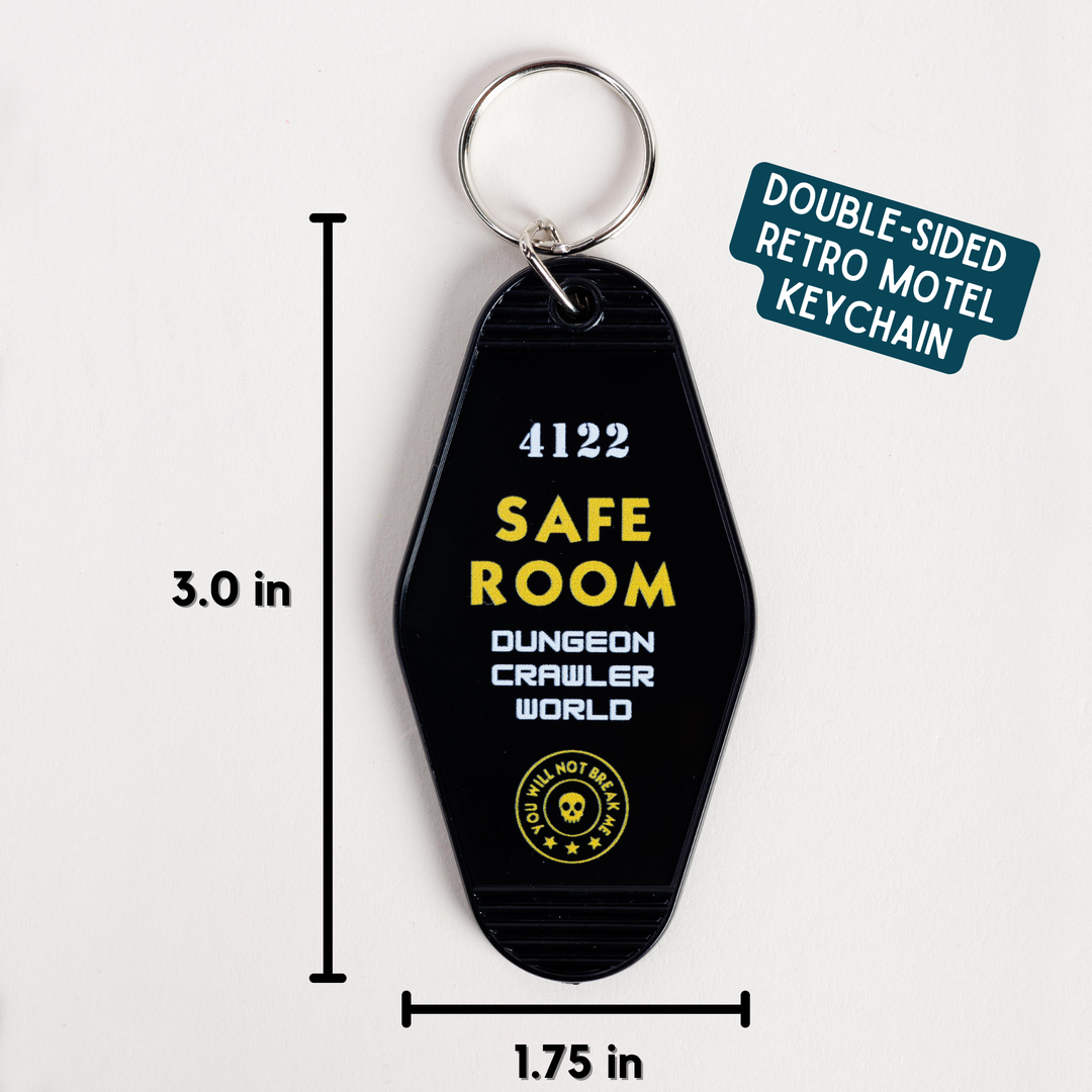 Black keychain with yellow text and measurements on a white background