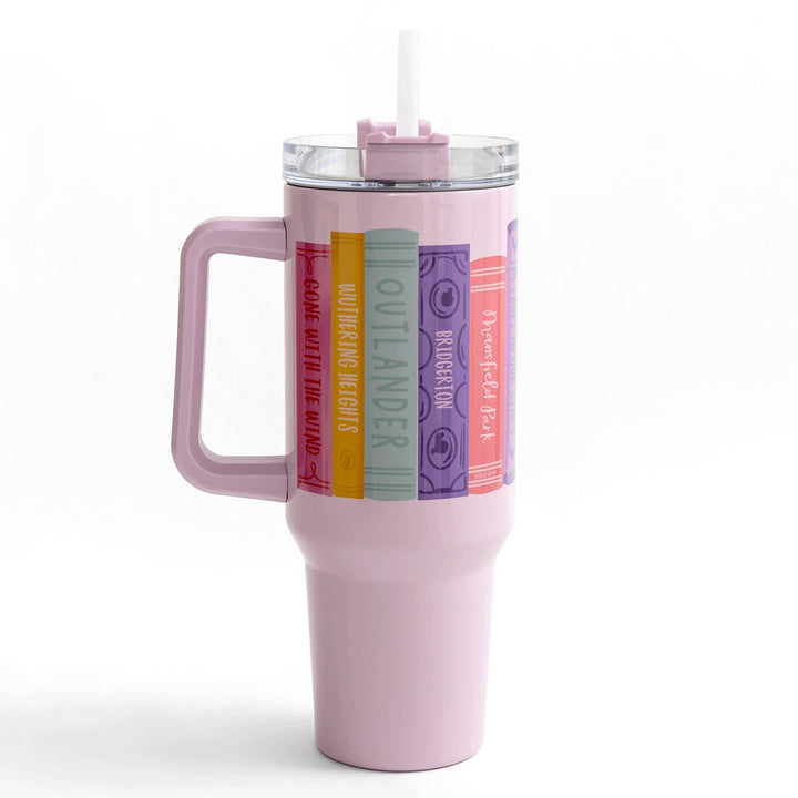Pink tumbler with handle and colorful labels on a white background