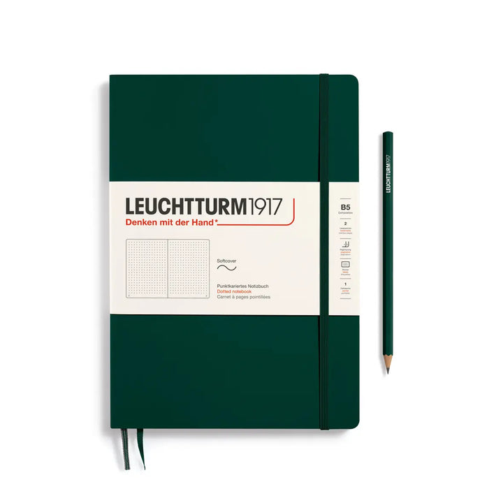 Green notebook with Leuchtturm1917 branding and a pencil on a white background