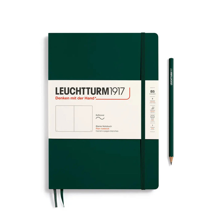 Green notebook with Leuchtturm1917 branding and a pencil on a white background