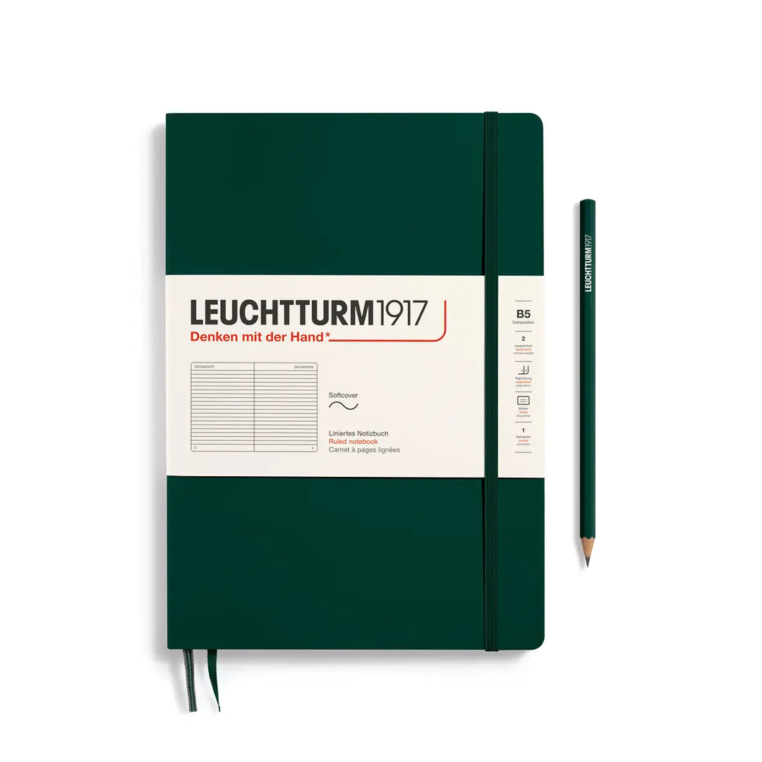 Green notebook with Leuchtturm1917 branding and a pencil on a white background