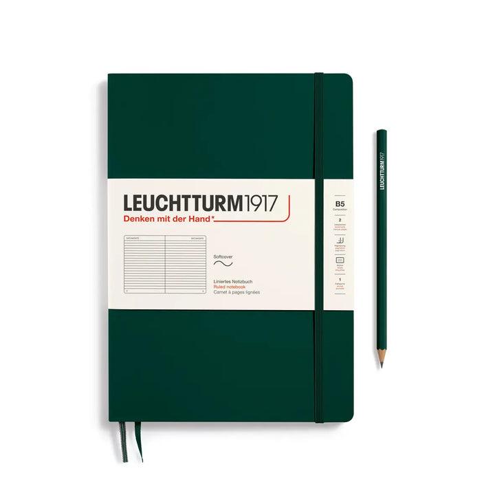 Green notebook with Leuchtturm1917 branding and a pencil on a white background