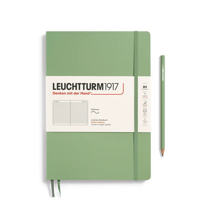 Green notebook with a pencil on a white background, featuring Leuchtturm1917 branding.