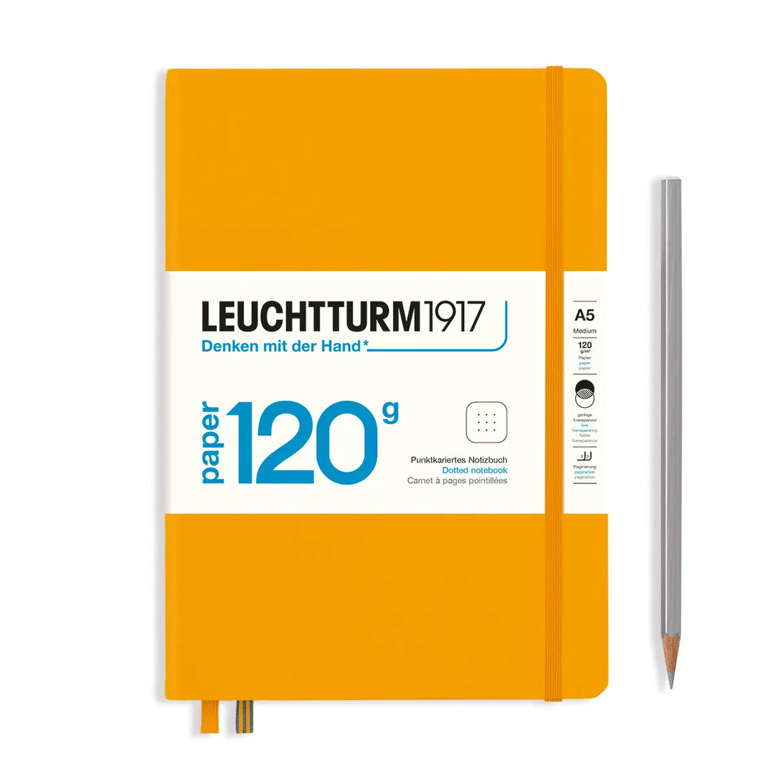 Golden yellow notebook with white label featuring 'Leuchtturm1917' branding on a white background