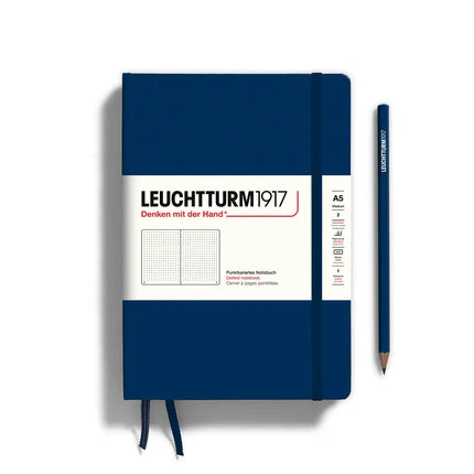 Blue notebook with white label featuring 'Leuchtturm1917' on a white background
