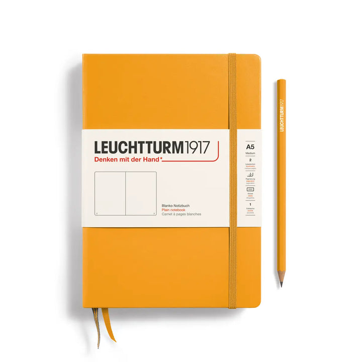 Golden yellow notebook with Leuchtturm1917 branding on a white background