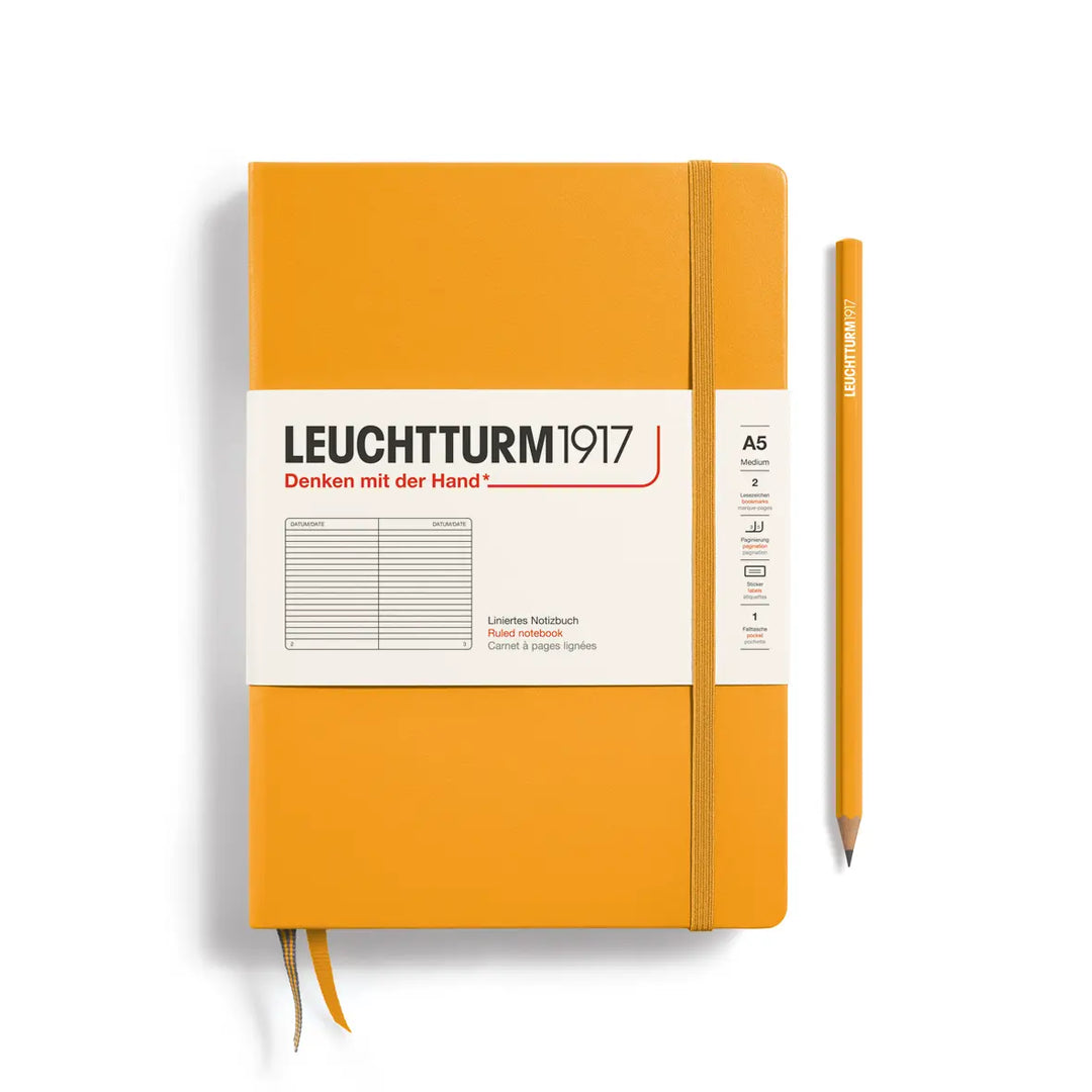 Golden yellow notebook with Leuchtturm1917 branding on a white background