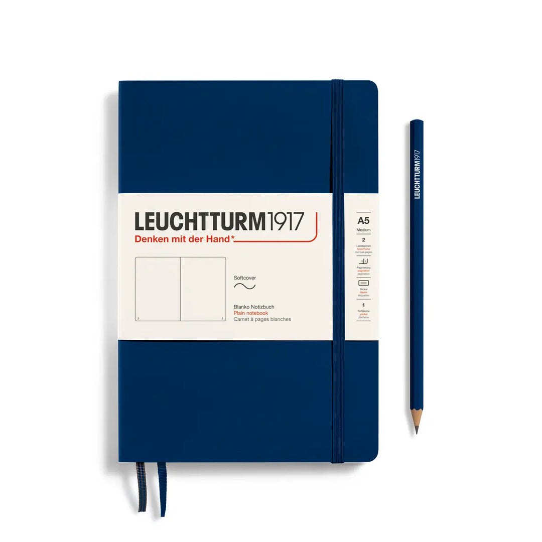 Blue notebook with white label and pencil on a white background, featuring Leuchtturm1917 branding.