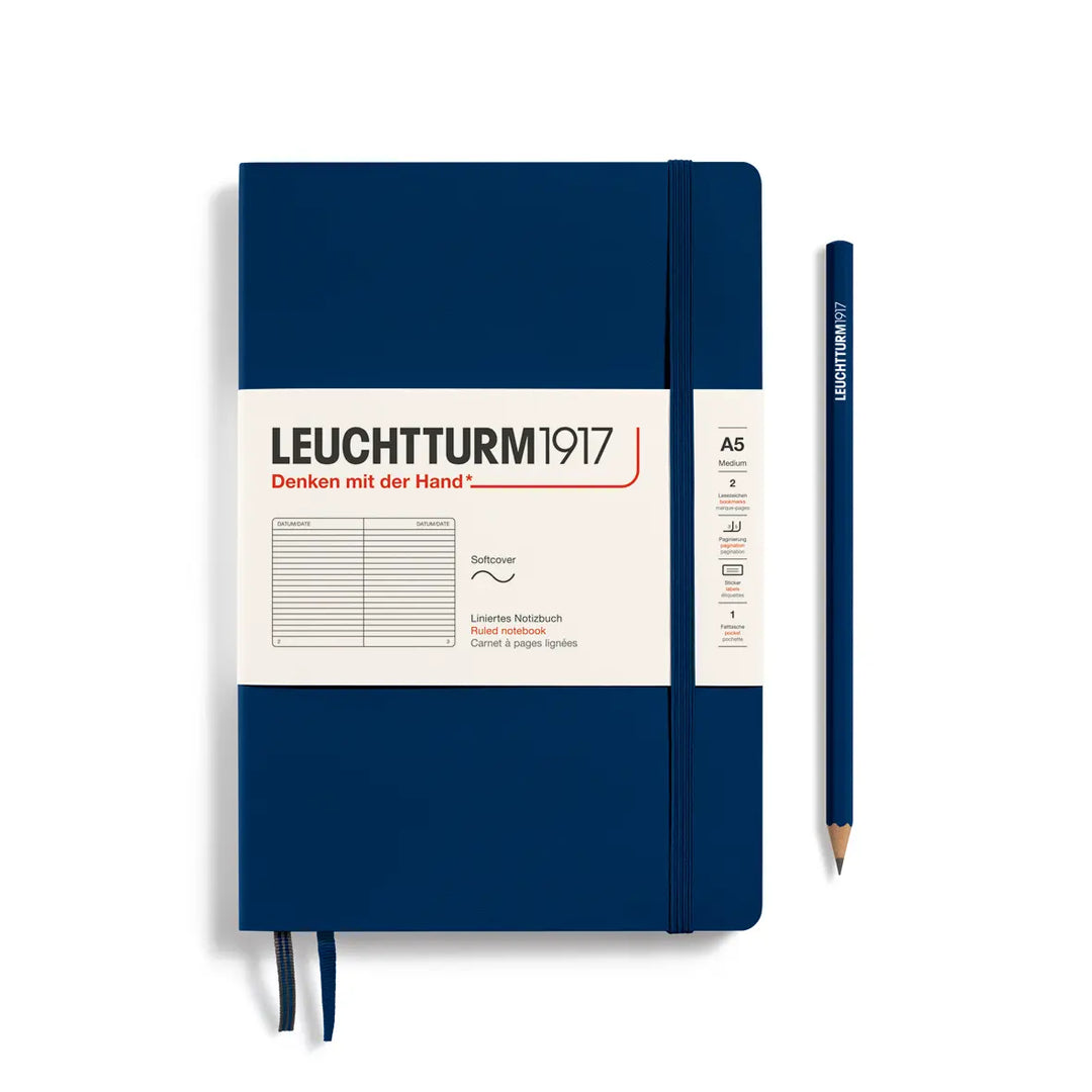 Blue notebook with white label and pencil on a white background, featuring Leuchtturm1917 branding.