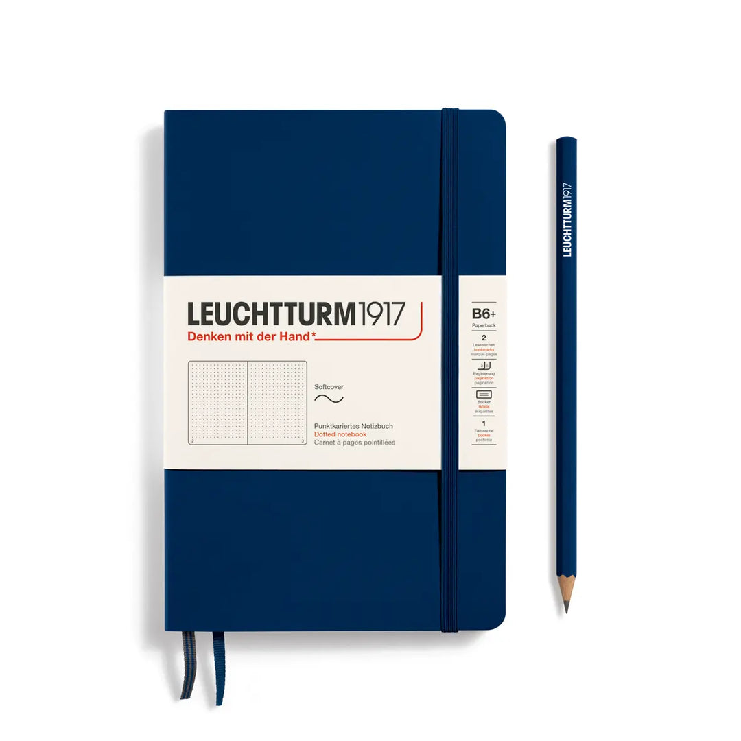 Blue notebook with a pencil on a white background, featuring Leuchtturm1917 branding.