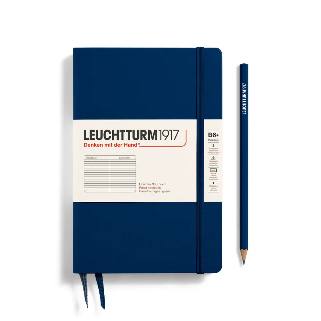 Blue notebook with a pencil on a white background, featuring the Leuchtturm1917 brand.