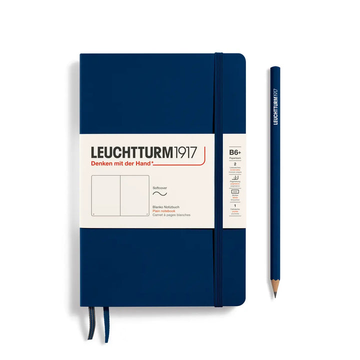 Blue notebook with a pencil on a white background, featuring Leuchtturm1917 branding.